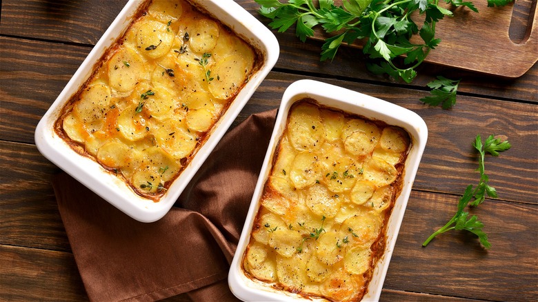 Au gratin potatoes in casserole dishes  