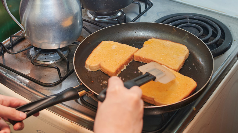 bread being pan fried