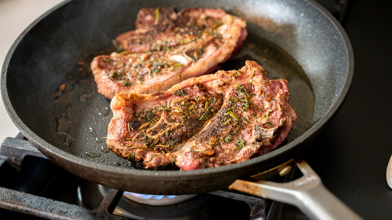 lamb shoulder chops in skillet 