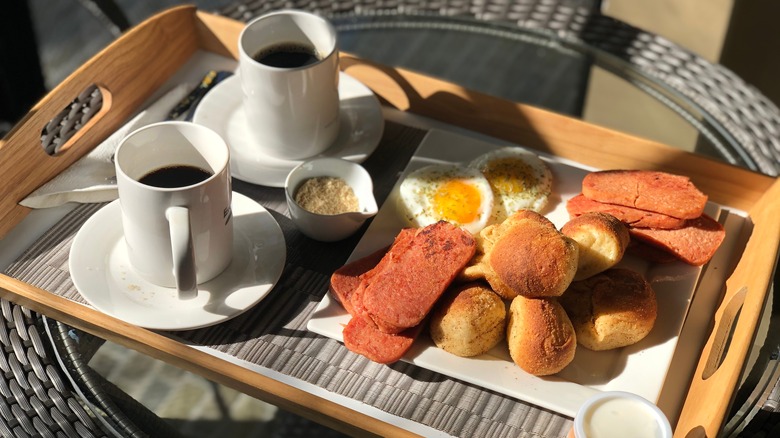 Traditional Filipino breakfast with pandesal and eggs