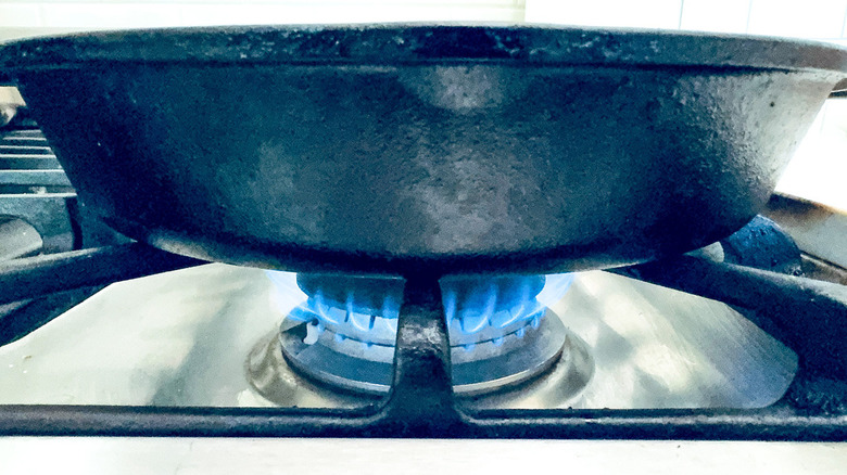 frying pan on gas burner