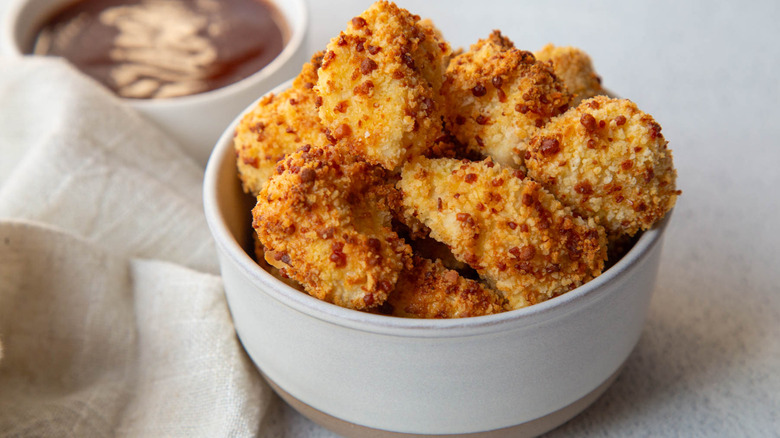 Chicken nuggets in a white bowl