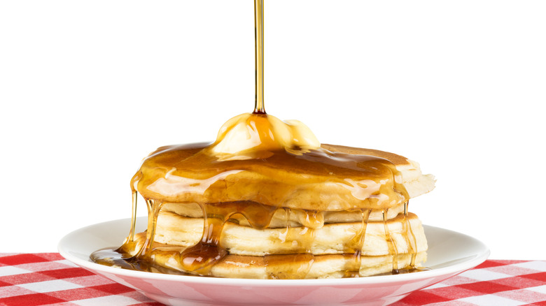 syrup poured on pancakes