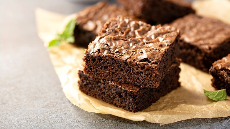 Cut brownies on parchment paper 