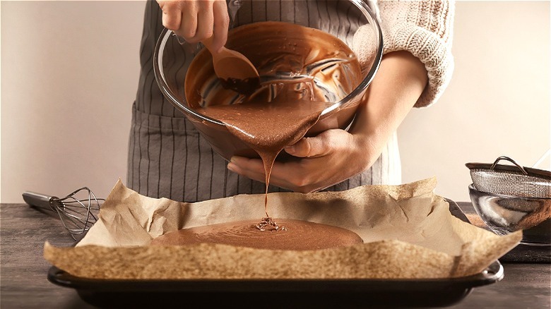 Batter poured onto parchment paper 