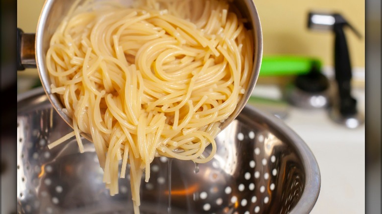 Straining pasta after cooking