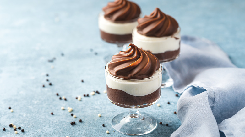 white and dark chocolate mousse in glasses