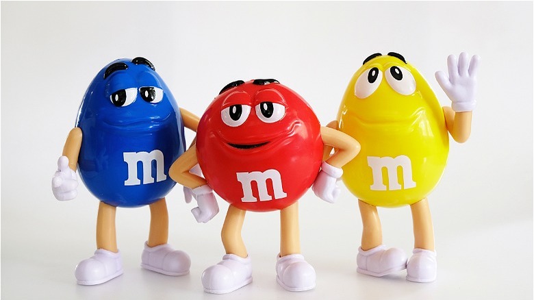 Blue, red, and yellow M&M characters 