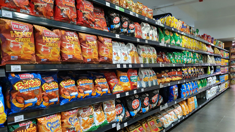 A row of convenience store snacks ready for purchase.