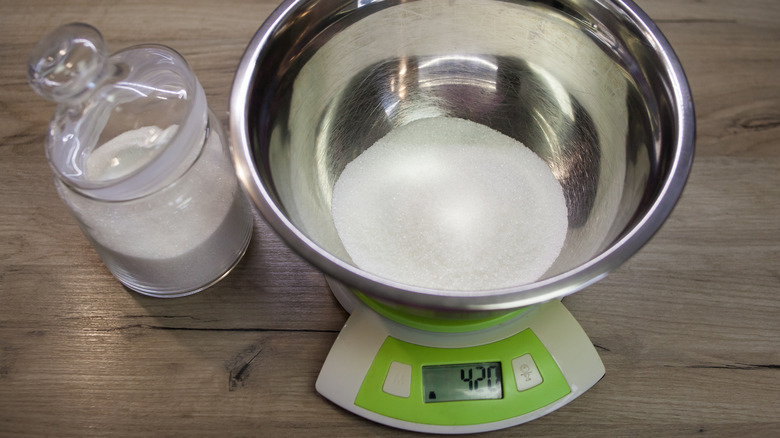 measuring sugar with digital scale