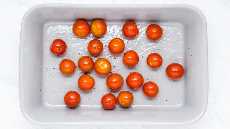 cherry tomatoes in a roasting dish