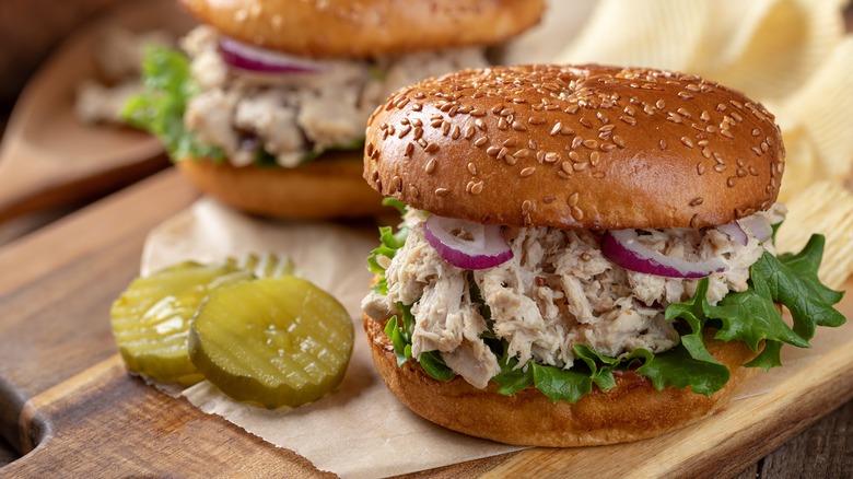 Tuna salad sandwiches with pickles