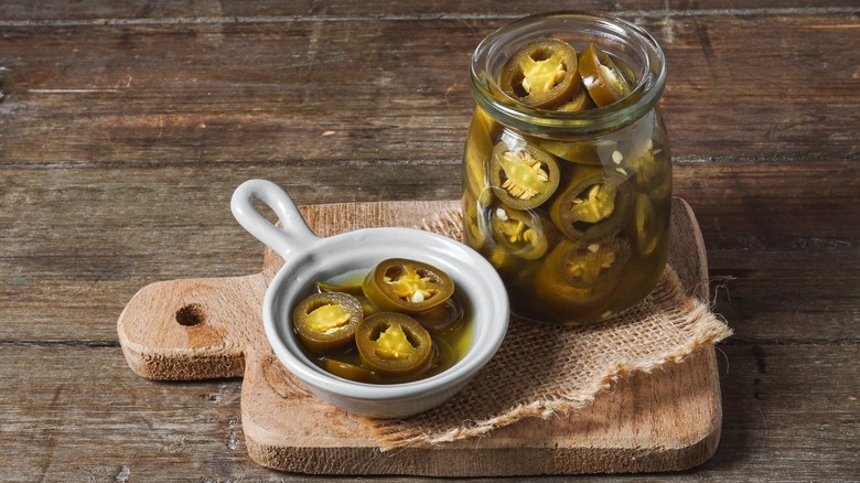 Pickled jalapeños in a jar