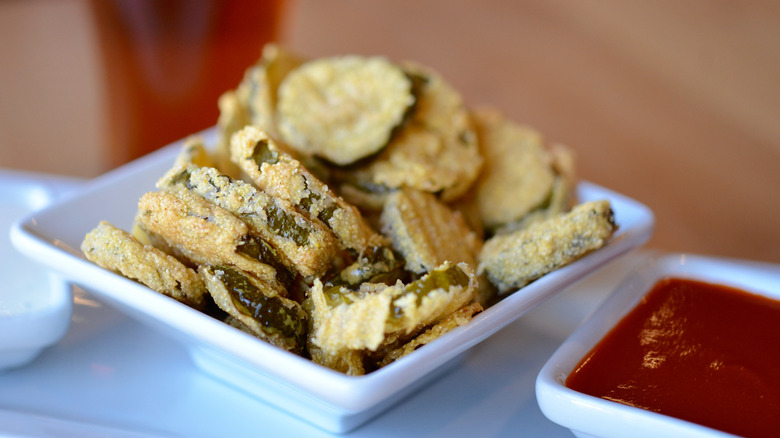 Fried pickles with hot sauce