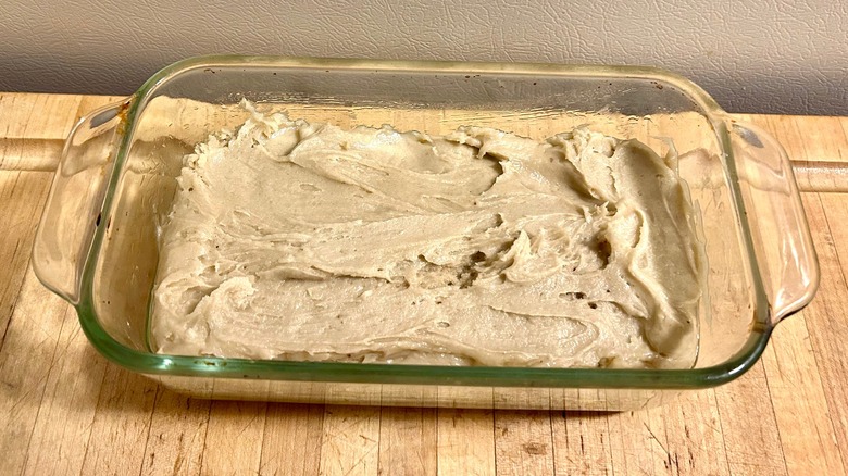 Banana bread batter in pan