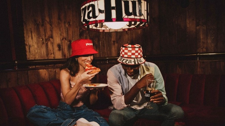 Pizza Hut bucket hats on models