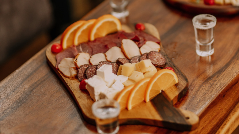 charcuterie board with tequila shots