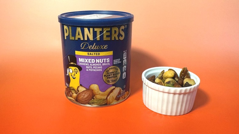 can and bowl of mixed nuts