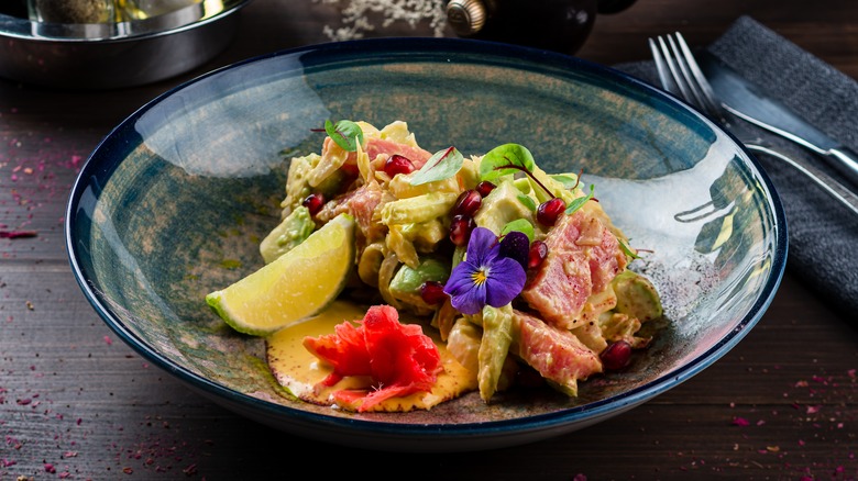 Fresh tuna salad with pomegranate seeds