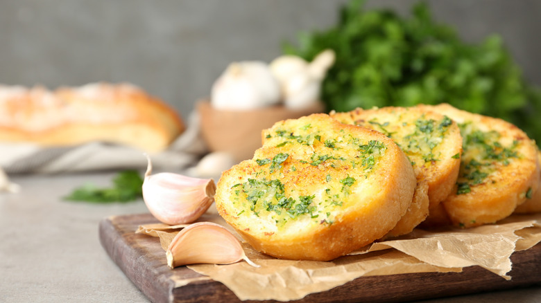 Garlic bread on a cutting board