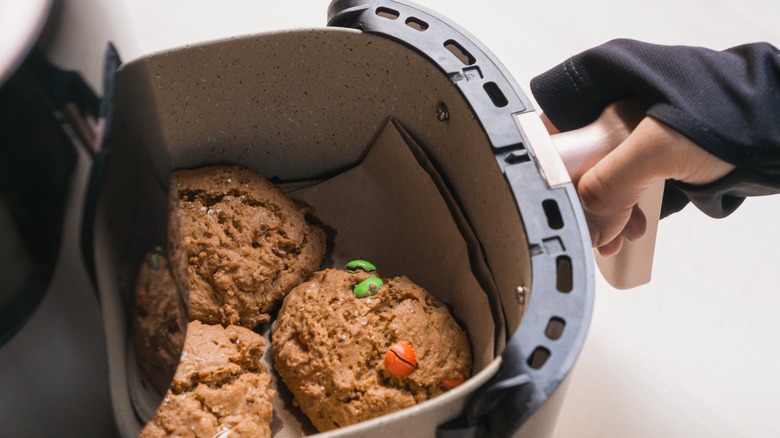 Three M&M cookies in the air fryer