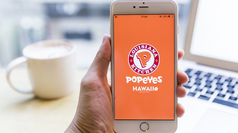 Phone showing Popeye's mobile app