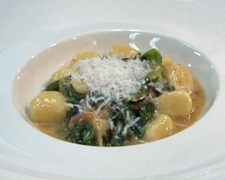 Potato Gnocchi with Escarole, Speck, Sweet Onions, and Fennel Pollen