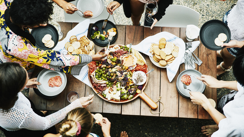 guests gathered around dining table