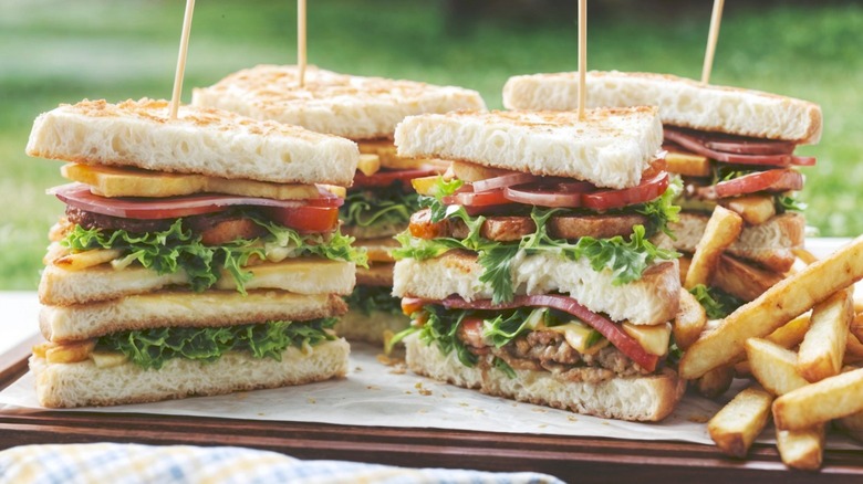 sandwiches on picnic blanket