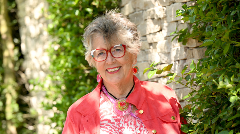 Prue Leith against wall with leaves