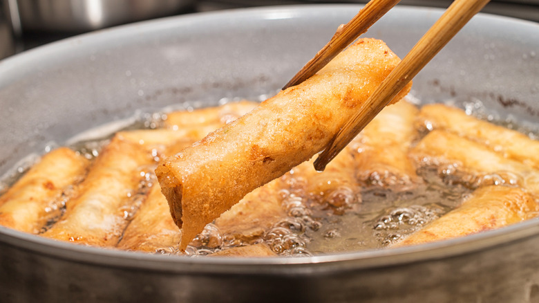 frying egg rolls in hot oil