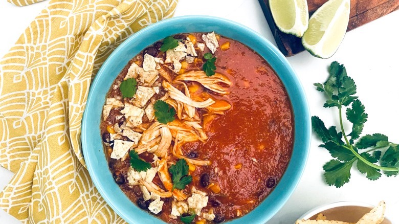 red soup in blue bowl 