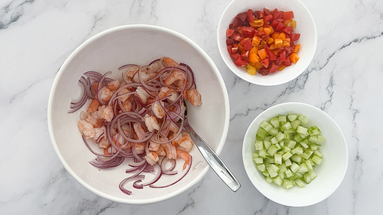 shrimp ceviche ingredients in bowls