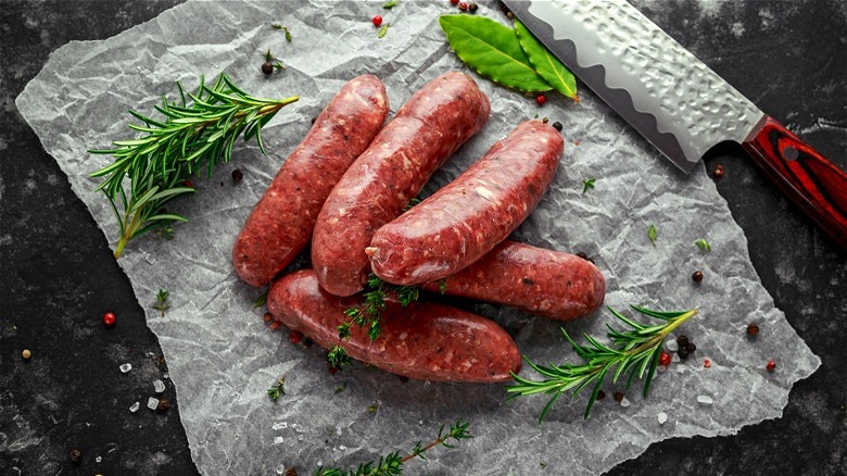 Fresh sausage on parchment paper 