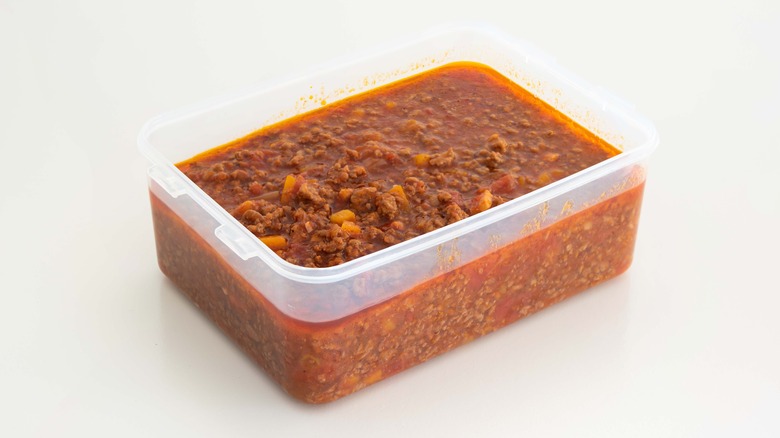 Container of Bolognese sauce