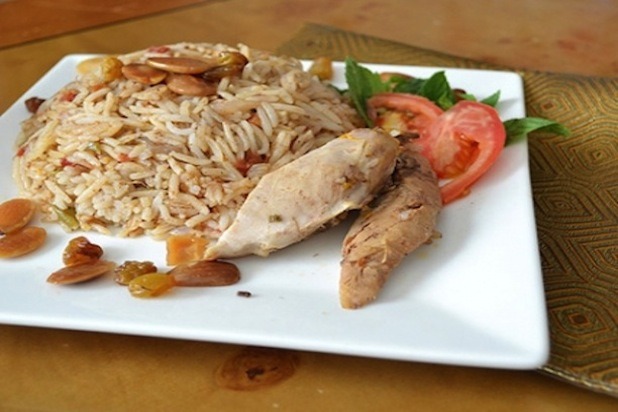 Kabsa (Spiced Chicken and Rice with Almonds and Raisins)