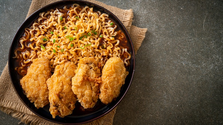 Fried chicken on a bed of ramen noodles