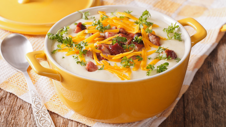 Potato soup pot on table