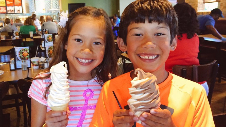 Kids holding soft serve cones