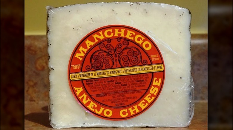 Manchego Añejo Cheese in plastic 