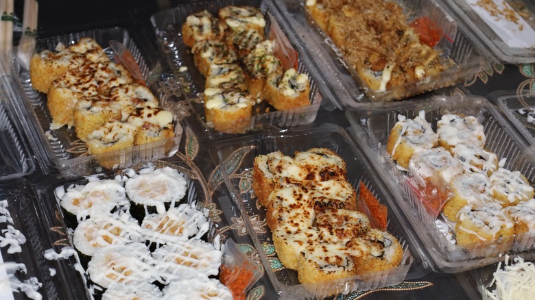 trays of prepared sushi