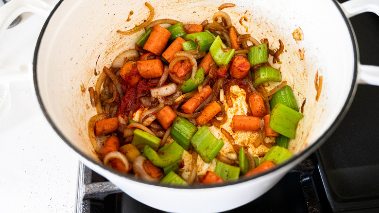 chopped vegetables in white pot