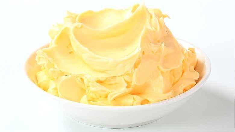 Creamy butter in white bowl