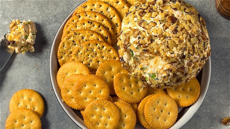 Cheese ball with almonds and crackers 