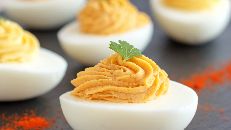 Deviled eggs close up with parsley garnish 