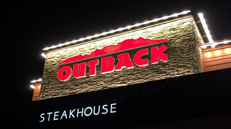 Outback Steakhouse sign at night