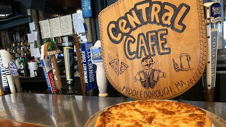 Central Cafe sign and pizza