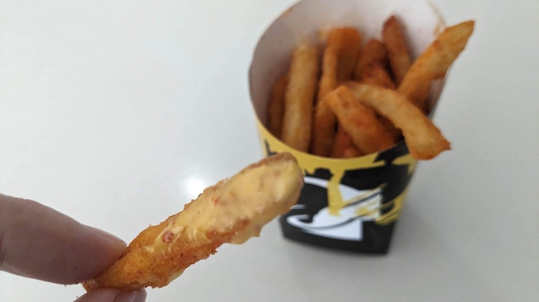 Nacho fry dipped in Yellowbird habanero ranch