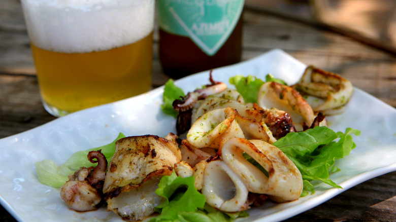 Calamari on plate with greens 