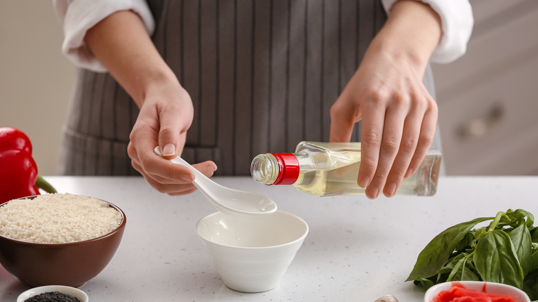 Rice vinegar poured into bowl